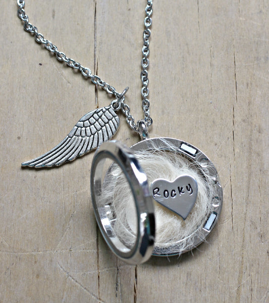 Personalised pet memorial locket necklace with magnetic glass, holding a heart charm, pet photo, and fur keepsake